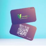 Two VCard NFC cards floating, with one displaying the "VCard" logo and the text "Tap, Share, Connect," and the other featuring a QR code and a website URL (www.vcarde.com).